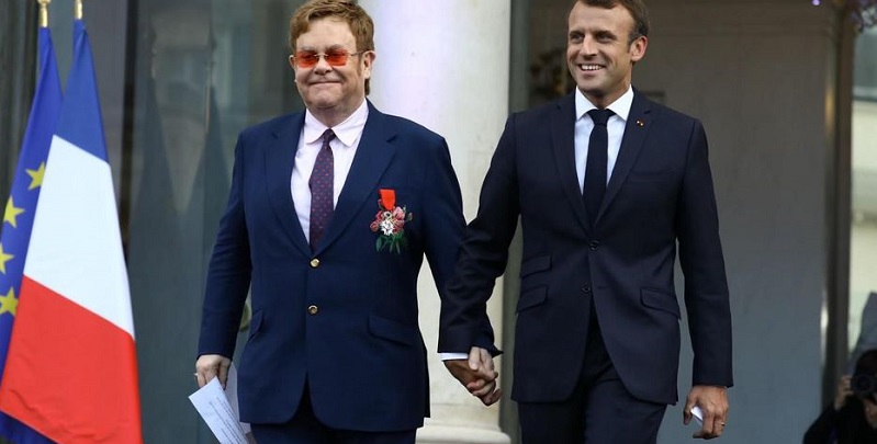 Le président Macron, Elton John et son mari se mobilisent contre le Sida