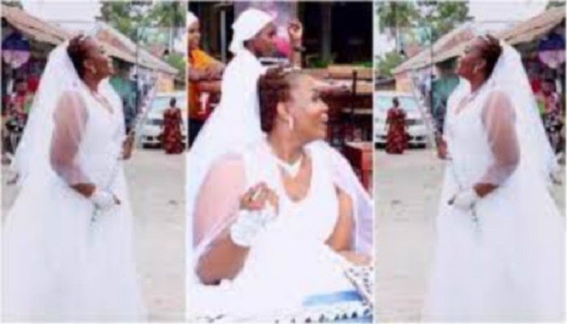 « J’ai de l’argent… je suis vierge… » : une dame désespérée en robe de mariée cherche un mari dans la rue (vidéo)